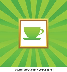Image of cup on saucer in golden frame, on green abstract background
