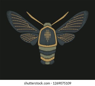 Image of a decorative ornate Sphingidae butterfly. Imitation of embroidery, mesh, glass beads