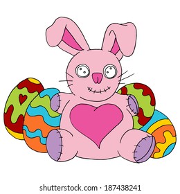 An image of an Easter bunny stuffed animal with decorated eggs.