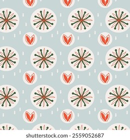 The image features a repeating pattern of circular floral designs and heart-shaped motifs on a light blue background. The floral designs are green and red, while the heart shapes are red with white 