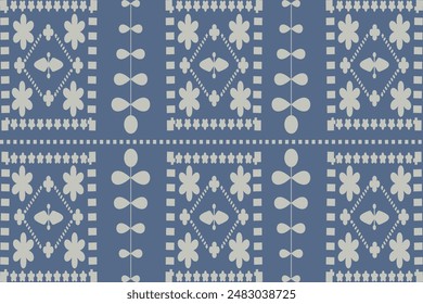 La Imagen presenta un patrón de arte popular simétrico y repetitivo con una combinación de Formas florales y geométricas. El diseño muestra un esquema de color de doble tono con Elementos en blanco sobre un fondo profundo