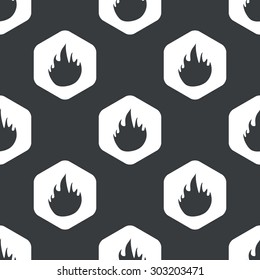 Image of flame in hexagon, repeated on black