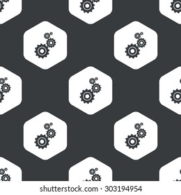 Image of four gears in hexagon, repeated on black