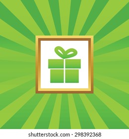 Image of gift box in golden frame, on green abstract background