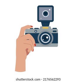 Image of hand with photo camera on empty white background.