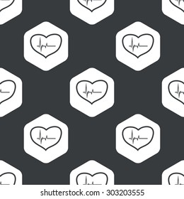 Image of heart with cardiogram in hexagon, repeated on black