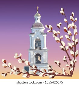  image of a high white Church bell tower and twigs of spring flowering willow against the evening sky