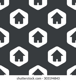Image of house in hexagon, repeated on black