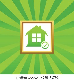 Image of house and tick mark in golden frame, on green abstract background
