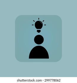 Image of light bulb above person in square, on pale blue background