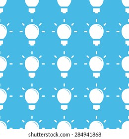 Image of light bulb, repeated in straight lines on blue background