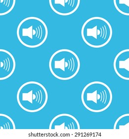Image of loudspeaker in circle, repeated on blue background