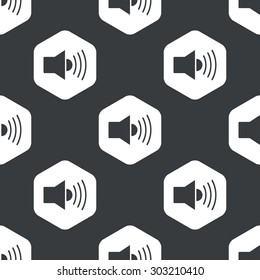 Image of loudspeaker in hexagon, repeated on black