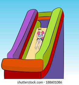 An image of a mother and child on an inflatable slide.