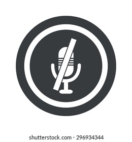Image of muted microphone in circle, on black circle, isolated on white
