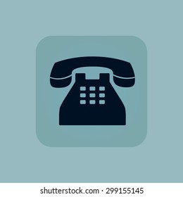 Image of old phone in square, on pale blue background