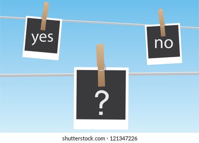 Image of pictures hanging on a clothes line with the words yes and no.