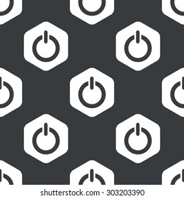 Image of power symbol in hexagon, repeated on black