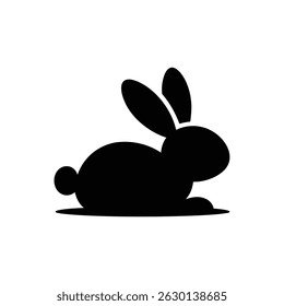 Image presents a solid black, flat vector icon of a sitting rabbit, depicted in silhouette against a stark white background. The rabbit is positioned in profile.