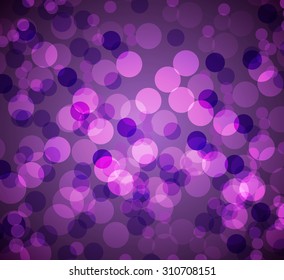 An image of a purple bokeh blurry lights background.