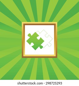 Image of puzzle and its contour in golden frame, on green abstract background