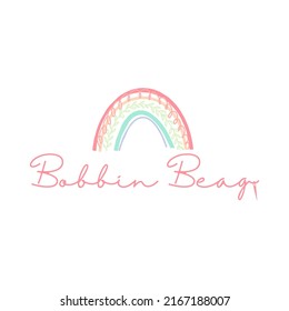 image of a rainbow with candy colors made of threads sewn into a shal or macrame