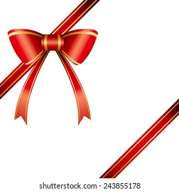 An image of a red and gold bow with ribbon.