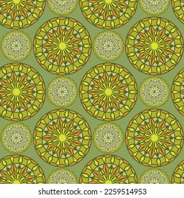 Image of seamless beautiful patterned circles on a green background.Can be used for designer wallpapers, for textile, packaging, printing or any desired idea. Different elements of paisley.