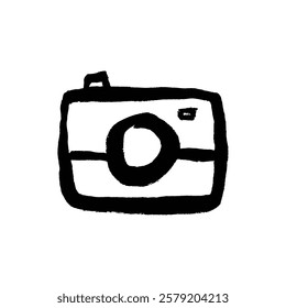 The image shows a simple hand drawn sketch of a camera in black and white.