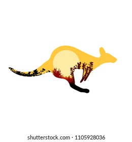 Image silhouette of jumping australian kangaroo with desert bush.