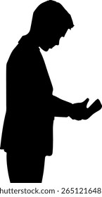 The image is a silhouette of a person, possibly a man in a suit, appearing to be looking down at something in their hands, conveying a sense of contemplation or introspection.