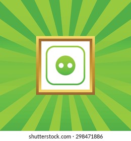 Image of socket in golden frame, on green abstract background
