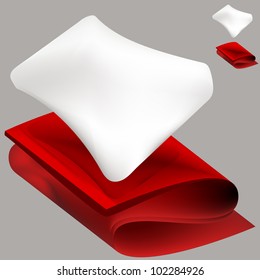 An image of a soft white pillow and a red folded blanket.