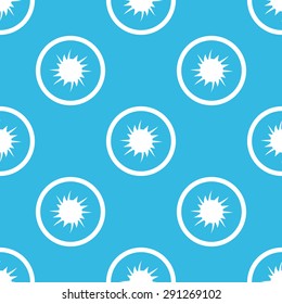 Image of starburst in circle, repeated on blue background