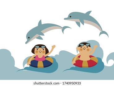 An image of swimming.
Boys and girls swimming in the sea.