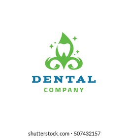 The image of the tooth on a background of green plants. It can be used as a logo for dental company.