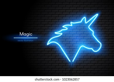 Image of a Unicorn made of neon lamps on a background in the form of a dark brick wall. Hand of Horse with horn with bright neon light.