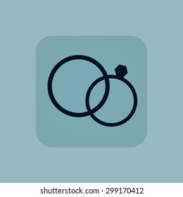 Image of wedding rings in square, on pale blue background