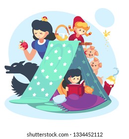 Imagination concept, child little girl with open book. Fairy Tales character Blanket fort happy childhood