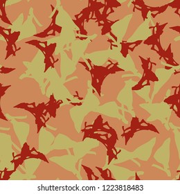 Imitation of camouflage - seamless pattern in different shades of red, green and pink colors. Seamless repeat UFO camo glamour pattern, usable as bright print or ornament, backdrop, background etc.