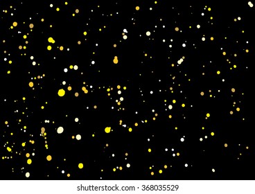 Imitation of gold glitter explosion on black background made of spray paint. Golden festive blow texture of confetti. Golden grunge grainy spray abstract texture of snowflakes. Holiday background.