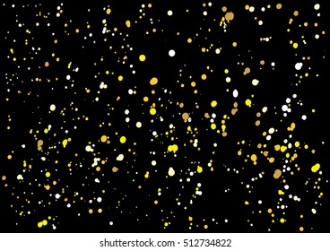 Imitation of gold glitter explosion on black background made of spray paint. Golden grunge grainy spray abstract texture of snowflakes. Holiday background.