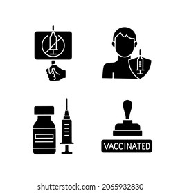 Immunization against virus black glyph icons set on white space. Anti vaxxer protest. Adult vaccination. Vial with syringe. Health care and medicine. Silhouette symbols. Vector isolated illustration