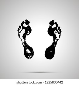 Imprints of bare human foots, simple black icon with shadow