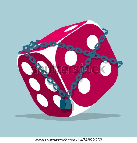 The imprisoned dice. Isolated on blue background.