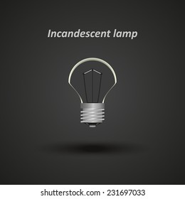 incandescent bulb on a gray background with shadow