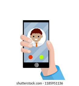 An incoming call on a mobile phone. The avatar of a friend - a talk with the businessman. Modern device in hand.
