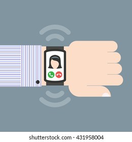 Incoming call on the SmartWatch on a businessman hand