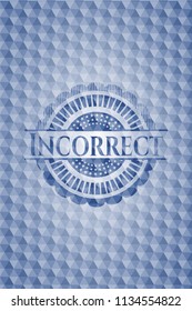 Incorrect blue emblem or badge with abstract geometric pattern background.