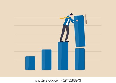 Increase investment profit, GDP rising up or growing business performance concept, success businessman standing on bar graph stacking huge amount of profit on top of this year bar graph.